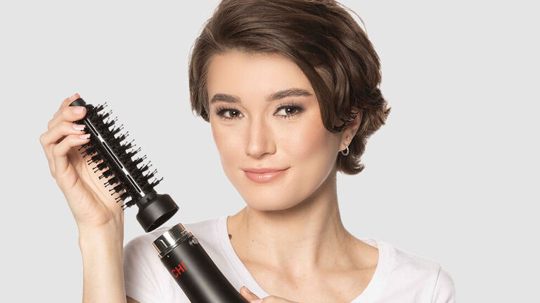 Innovations in Hair Blog Featured Image Model with Curling Iron